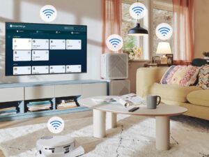L'interface utilisateur SmartThings est affichée sur le téléviseur. Les icônes Wi-Fi flottent au-dessus du téléviseur, du robot aspirateur, du purificateur d'air et des lumières.